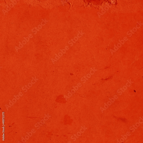 Cardboard red abstract pattern texture close-up. Retro old paper background. Grunge concrete wall. Vintage blank wallpaper. © artistmef