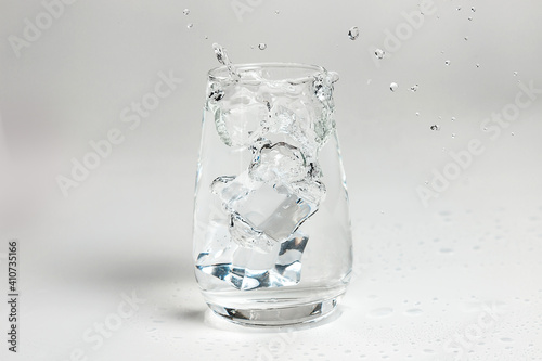 Glass of mineral carbonated water with ice