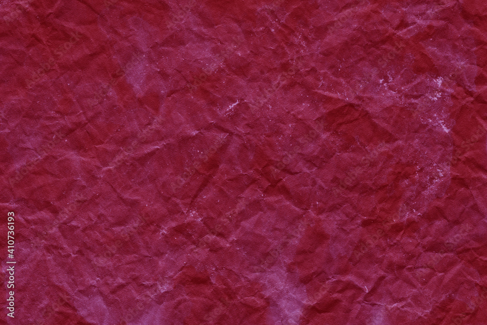 Fototapeta premium Cardboard red abstract pattern texture close-up. Retro old paper background. Grunge concrete wall. Vintage blank wallpaper.