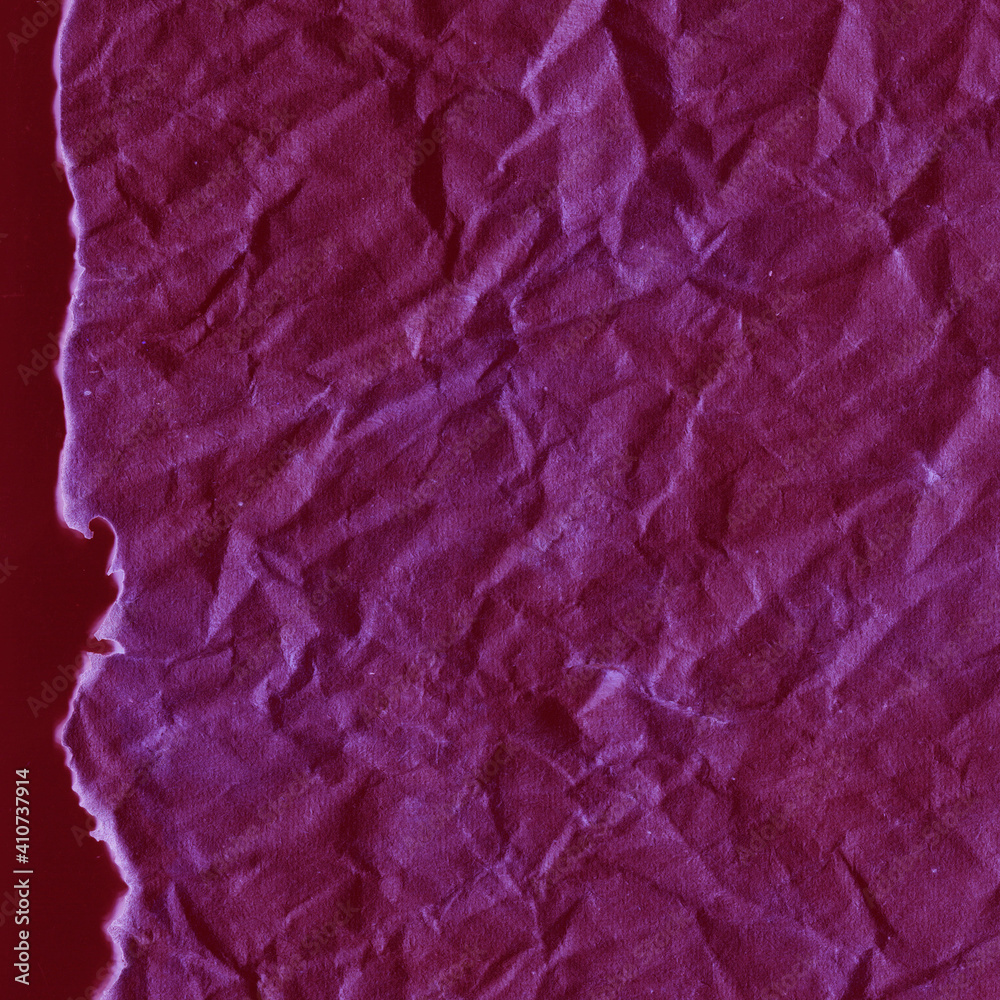 Fototapeta premium Cardboard red abstract pattern texture close-up. Retro old paper background. Grunge concrete wall. Vintage blank wallpaper.