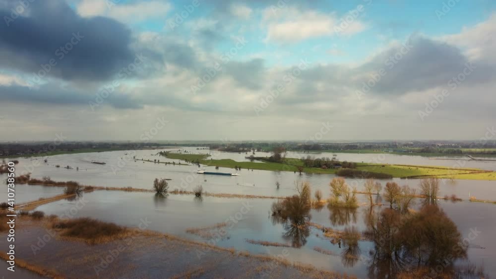 High water level on the floodplains of the river IJssel near the city of Zwolle in Overijssel, The Netherlands. Aerial drone point of view.