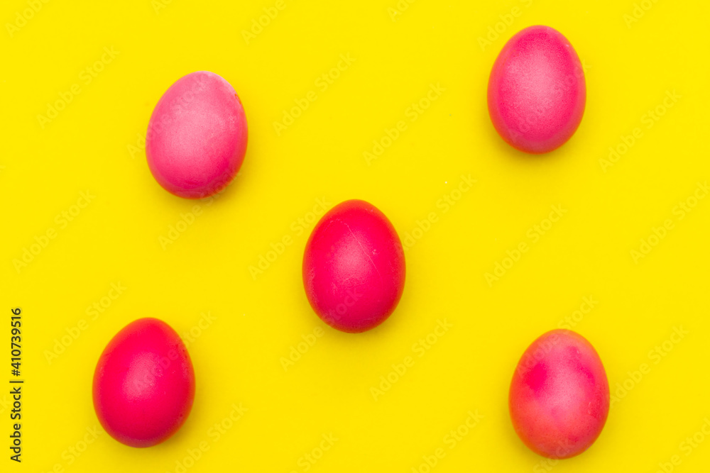 Painted eggs on a yellow background. Chicken eggs on a yellow background. Chicken eggs are colored. Easter. Orthodox holiday. An article about Easter. Article about eggs benefits and harms. Copy space Painted eggs on a yellow background. Chicken eggs on a yellow background. Chicken eggs are colored. Easter. Orthodox holiday. An article about Easter. Article about eggs benefits and harms. Copy space