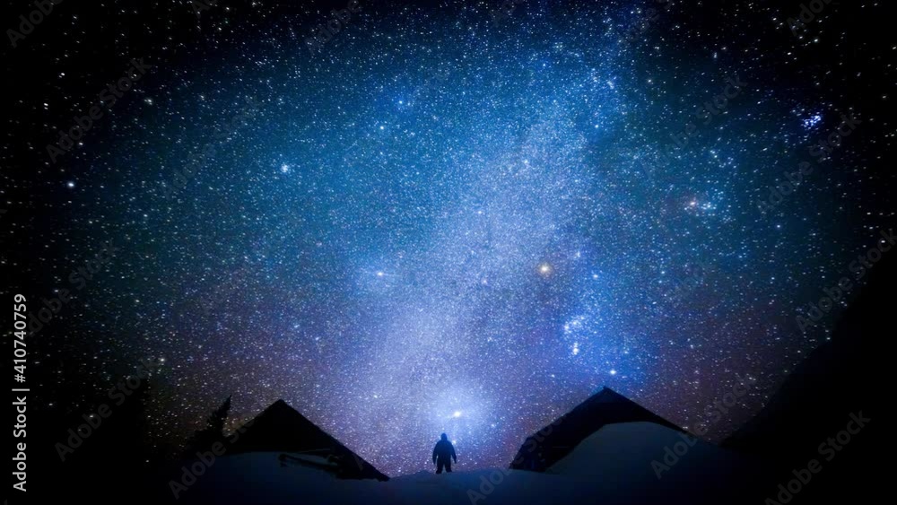 Human on the background of the twinkling starry sky. Cinemagraph. Human on the background of the twinkling starry sky. Cinemagraph.