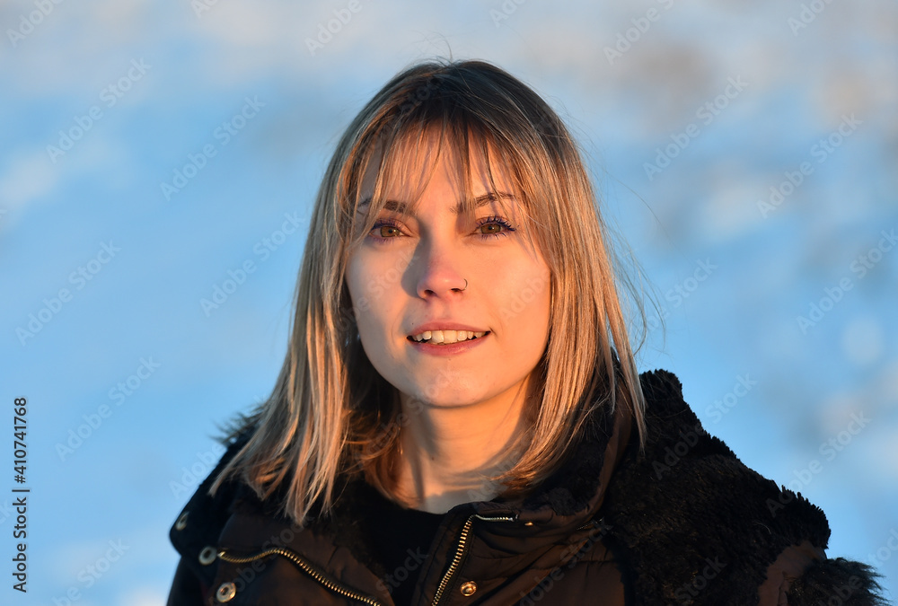 a beautiful young caucasian girl posing in the snow a beautiful young caucasian girl posing in the snow