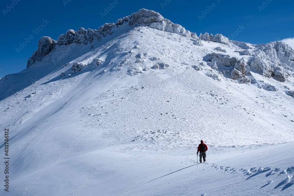 winter hiking sport at high peaks and peak success