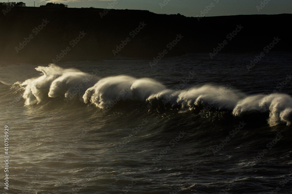 Fototapeta premium Huge waves hitting the cliff and exploding