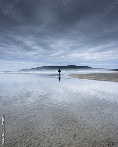 Moody beach person