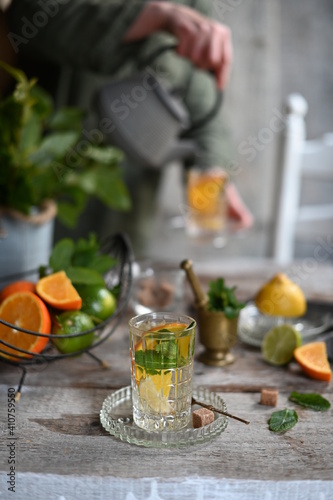 citrus tea with mint. Cup of tea with mint and lemon.