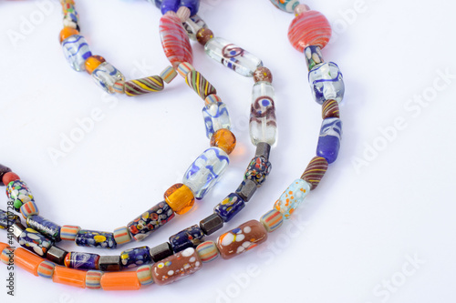 Bracelets and necklaces made of colorful beads photo