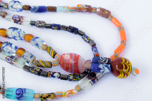 Bracelets and necklaces made of colorful beads photo