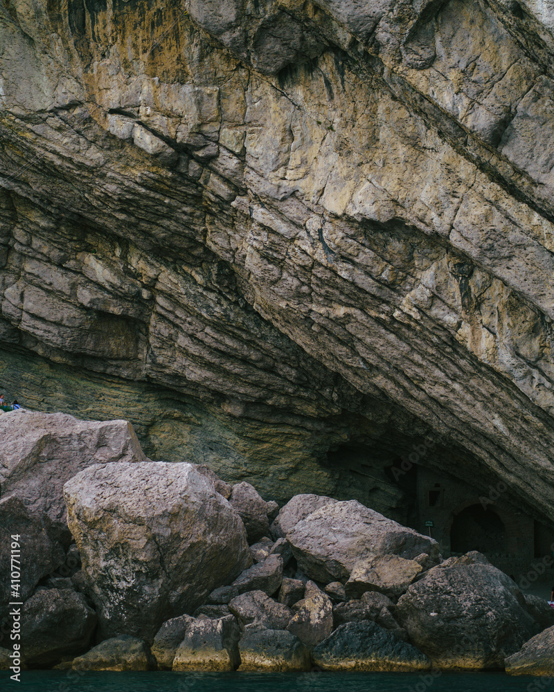 Beautiful patterned stones and cave entrance Beautiful patterned stones and cave entrance