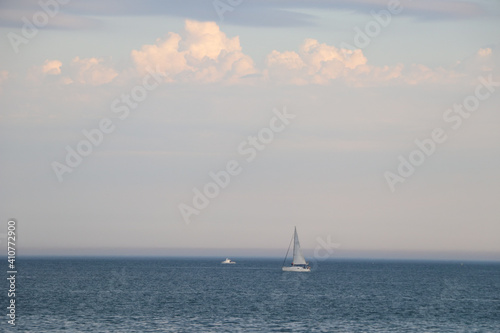yachts and boats float on the ocean under a beautiful sky © Serhii Photography