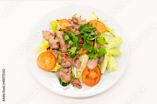 Thai Grilled Beef Salad. Lettuce,cucumber,tomato,red onion grilled beef.