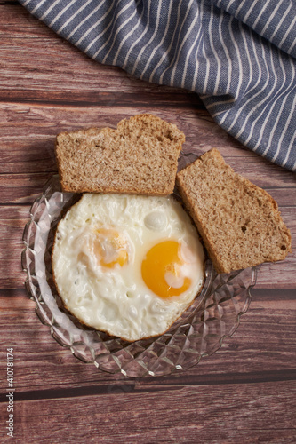 fried eggs with two slices of bread