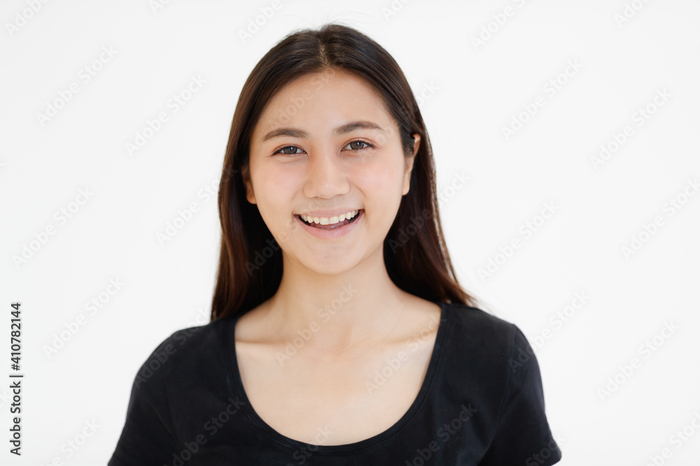 Portrait of cute young Asian woman in casual clothing on white background Portrait of cute young Asian woman in casual clothing on white background
