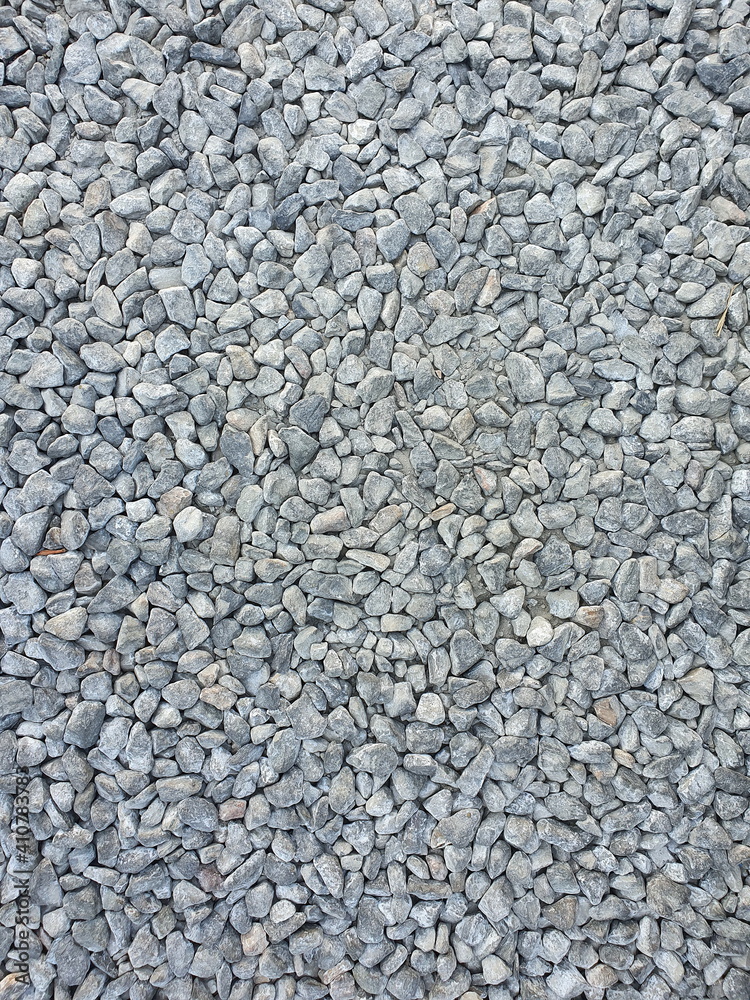 A walkway made of stones flake for walking in the garden. Or general roads Suitable for background images or fill in text.
