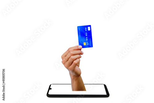 hand holding a credit card out of a smart phone on white background with clipping path. shopping on line on buy-sell with e-commerce technology.