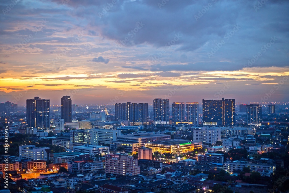 High Angle View Of Illuminated Buildings Against Sky During Sunset
