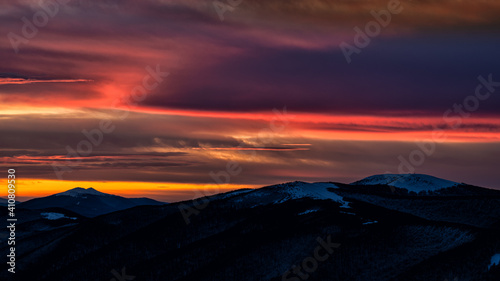 Fototapeta Naklejka Na Ścianę i Meble -  An awesome sky over the mountains. Ostra Hora and Wielka Rawka. Bieszczady National Park, The Carpathians, Ukraine and Poland.