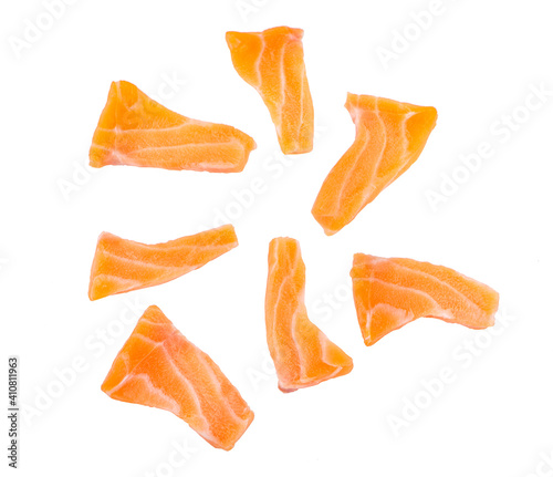 Slices of Raw Salmon Fillet Isolated on White Background Top View.