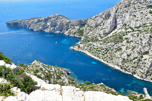 Picturesque bay with azure water surrounded by white mountains. Calanques Park near Marseille, France