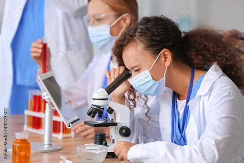 Young female scientist in f...