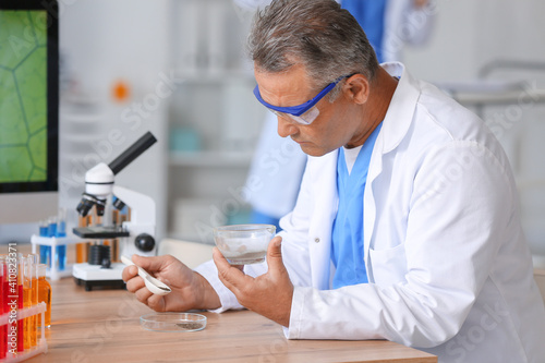 Male scientist working with...
