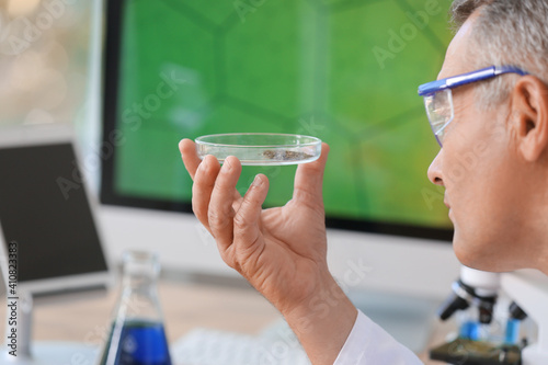 Male scientist working with...