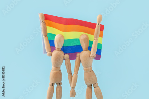 Wooden mannequins and rainb...