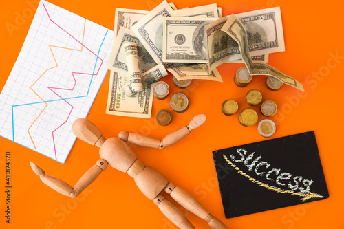 Wooden mannequin with money...