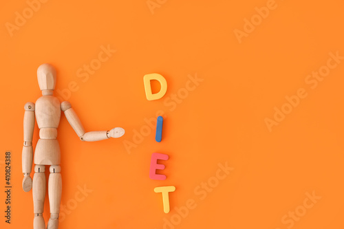 Wooden mannequin and word D...