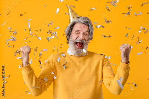 Mature man celebrating birt...