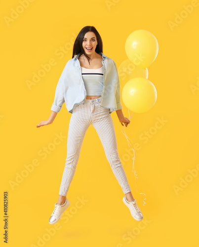 Beautiful jumping young wom...