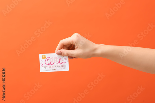 Female hand with gift card ...