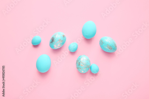 Beautiful Easter eggs on color background © Pixel-Shot