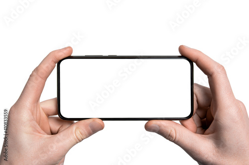 Mock up, mockup.Man hand holding the black smartphone with frame less blank screen and modern frameless design,vertical - isolated on white background.Clipping path.UI design interface