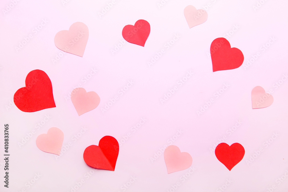 Pink background from different paper hearts