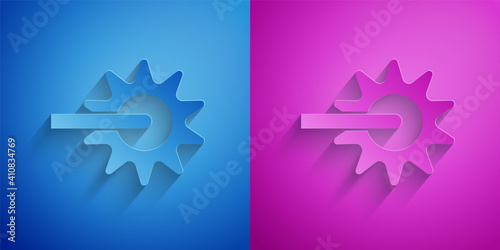 Paper cut Cowboy horse riding spur for boot icon isolated on blue and purple background. Paper art style. Vector.