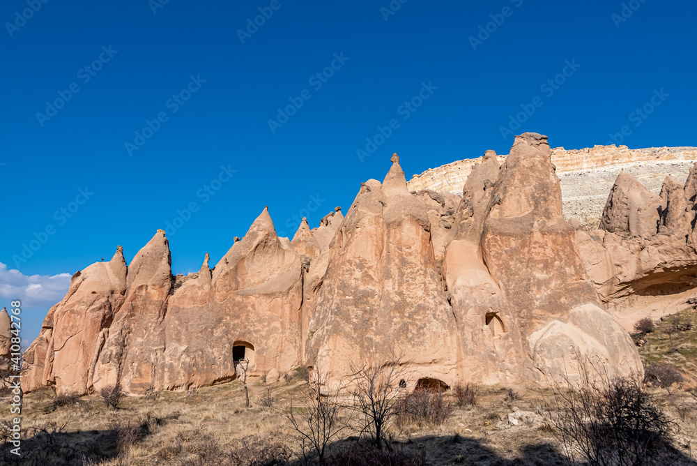 Fototapeta premium Beautiful historical and touristic places in Zelve valley , fairy chimneys, cave houses, Cappadocia, Nevsehir, Turkey