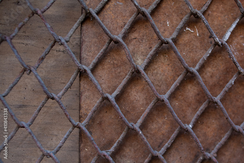 Old Vintage Wood Panel With Iron grid Pattern Horizontal Background. dirty mesh fabric. High quality photo
