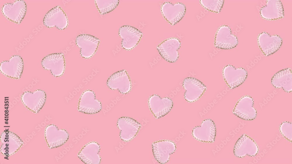 heart shaped cookies decorated with pink glaze wiggle on a pastel background heart shaped cookies decorated with pink glaze wiggle on a pastel background
