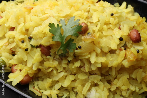 Indian Breakfast aalu Poha Also Know as kande Pohe made up of Beaten Rice or Flattened Rice. photo