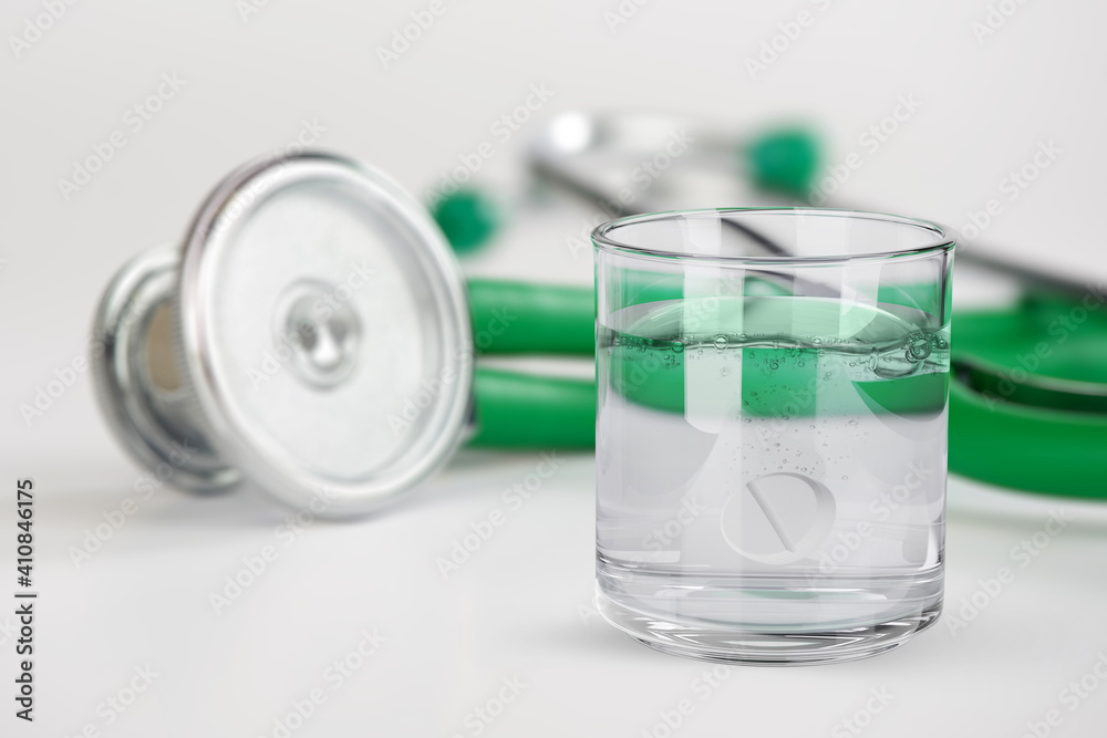 glass of water with tablet or pill glass of water with tablet or pill