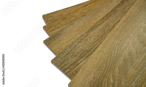 Vinyl tiles stack for home interior design for house renovation. New wooden pattern vinyl tile. Vinyl flooring material. Polymer vinyl sheet for new home floor. PVC material on white. Selective focus.