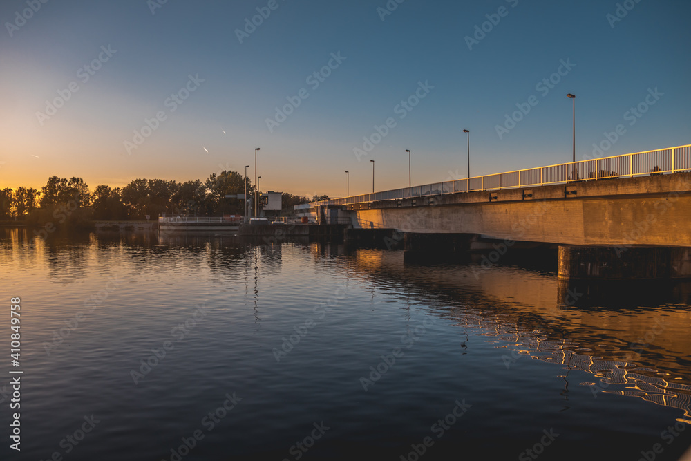 Beautiful sunset with reflections near Plattling, Isar, Bavaria, Germany Beautiful sunset with reflections near Plattling, Isar, Bavaria, Germany