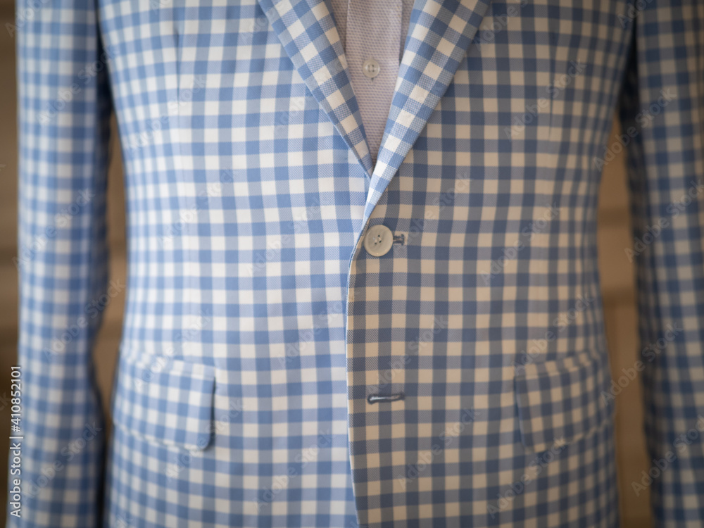 Close up of light blue casual jacket suit blazer with ascott scarf Close up of light blue casual jacket suit blazer with ascott scarf