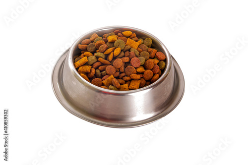 cat food in a stainless steel bowl, insulated on a white background