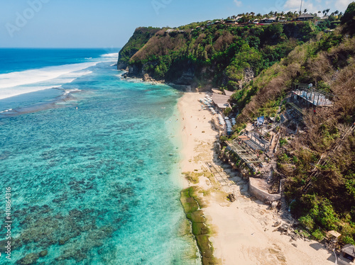 Aerial view of tropical beach with turquoise ocean in Bali