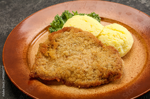 Crispy chicken schnitzel with mashed potato