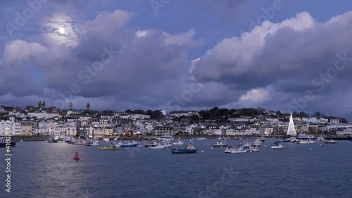 Timelapse video of pre-dawn hours looking towards Vicotria Pier in St Peter Port photo